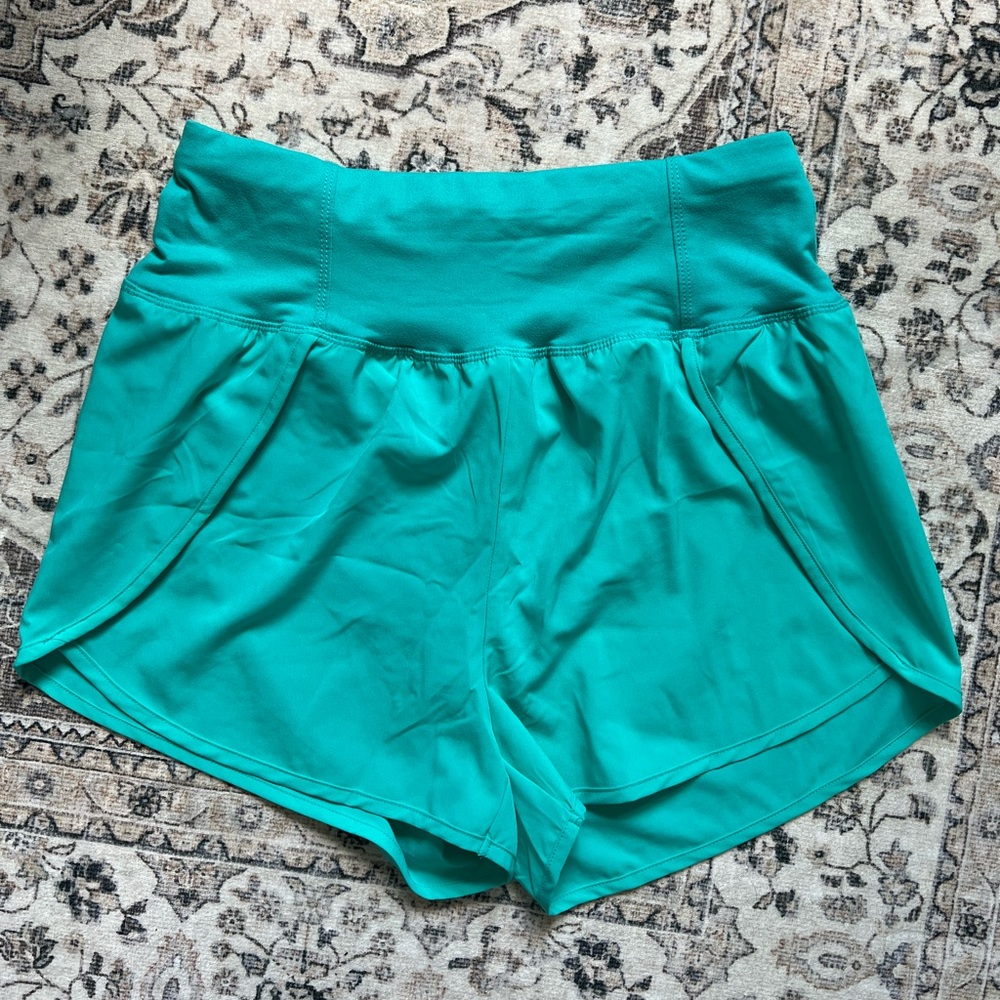 Turquoise High Waisted Split Hem Zipper Back Pocket Running Shorts